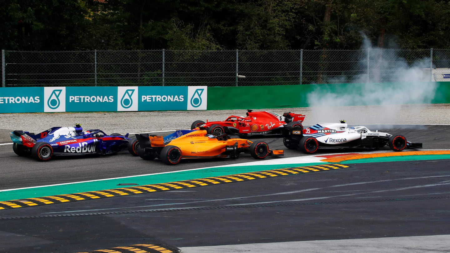 Sebastian Vettel, Ferrari SF71H spins after contact with Lewis Hamilton, Mercedes AMG F1 W09 on lap