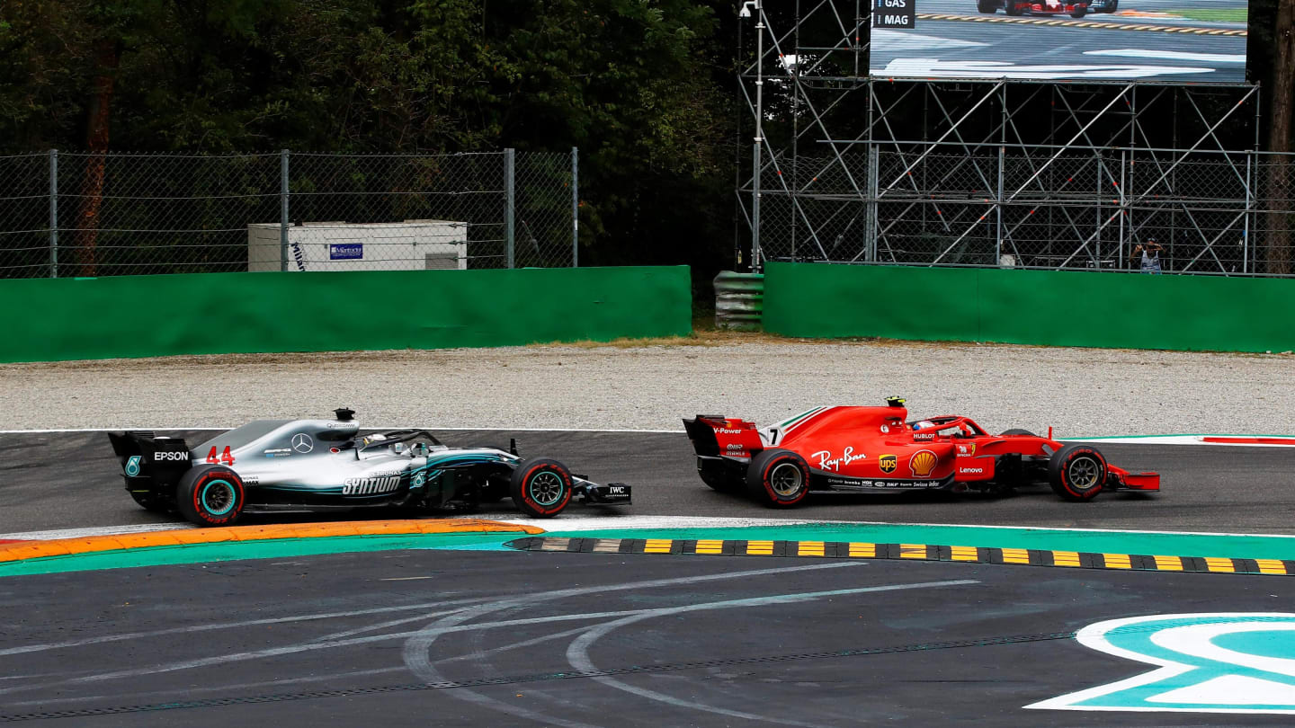 Kimi Raikkonen, Ferrari SF71H leads Lewis Hamilton, Mercedes AMG F1 W09 at Formula One World
