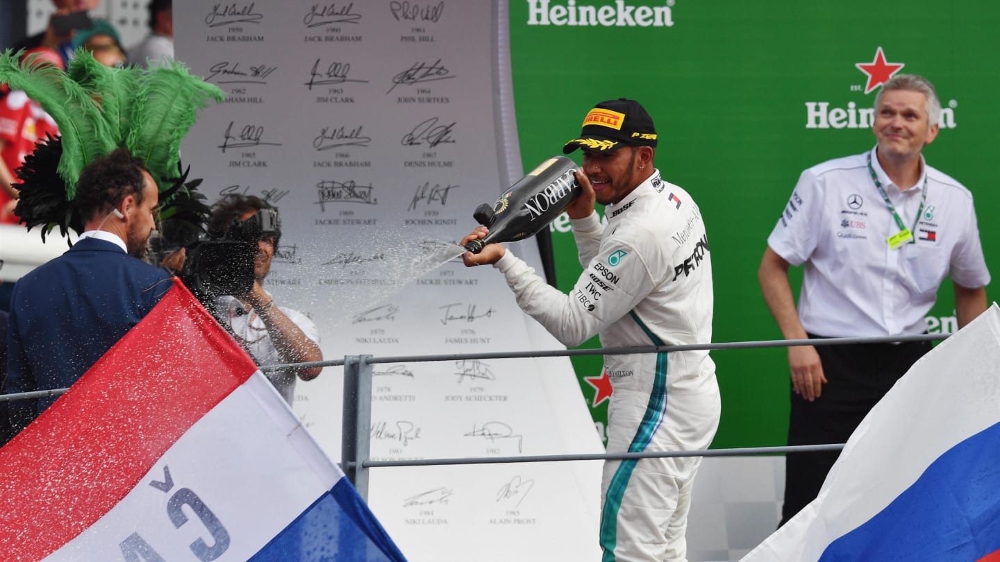 Race winner Lewis Hamilton, Mercedes AMG F1 celebrates on the podium with the champagne at Formula One World Championship, Rd14, Italian Grand Prix, Race, Monza, Italy, Sunday 2 September 2018. © Mark Sutton/Sutton Images