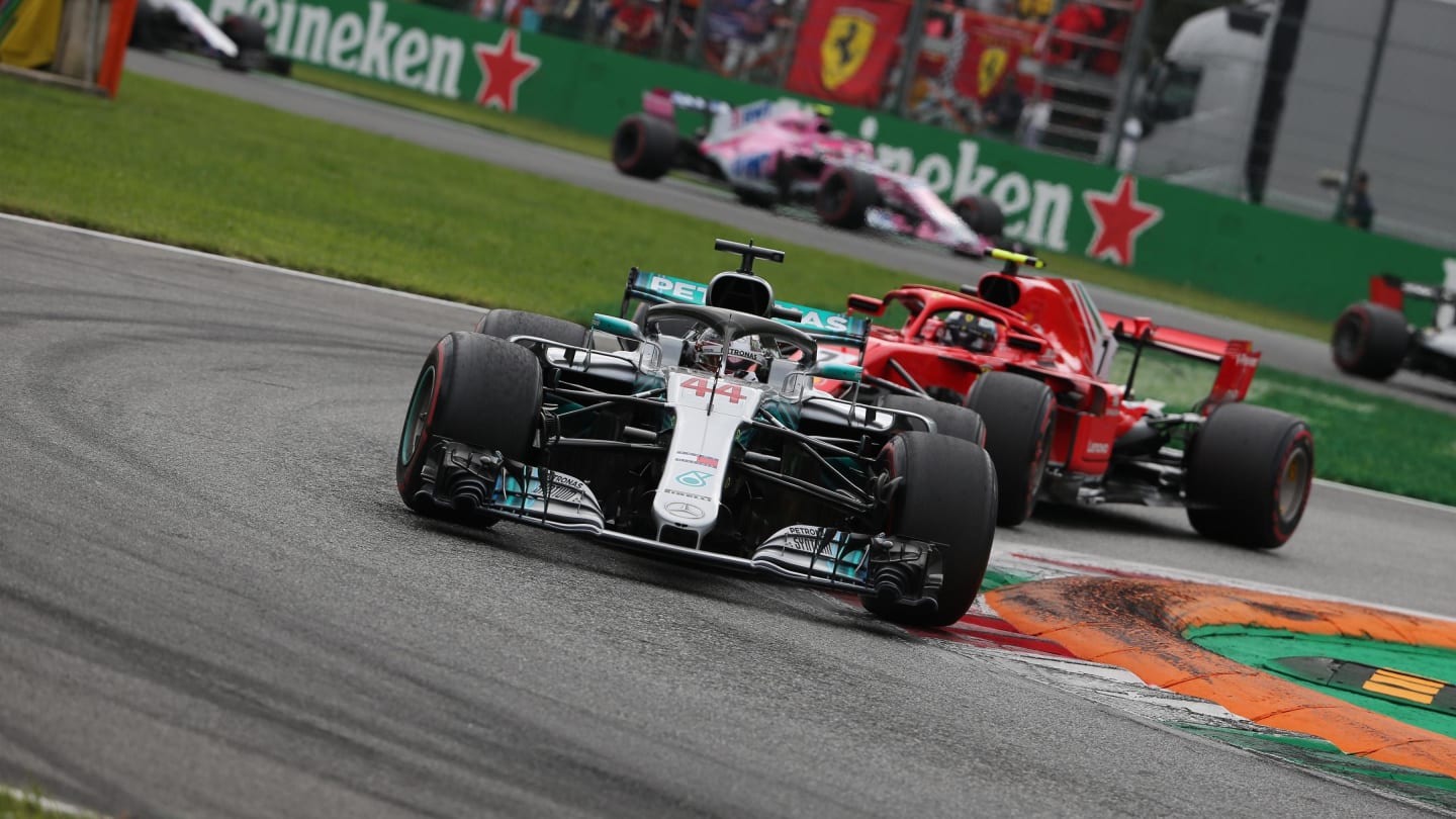 Lewis Hamilton, Mercedes AMG F1 W09 leads Kimi Raikkonen, Ferrari SF71H at Formula One World