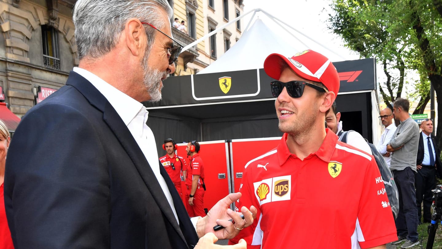 Maurizio Arrivabene, Ferrari Team Principal and Sebastian Vettel, Ferrari at Formula One World