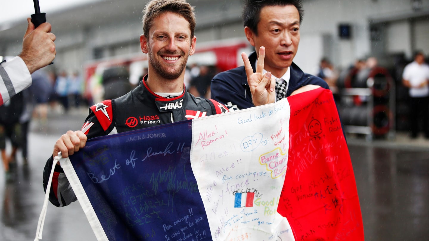 Romain Grosjean, Haas F1 Team with French flag at Formula One World Championship, Rd17, Japanese