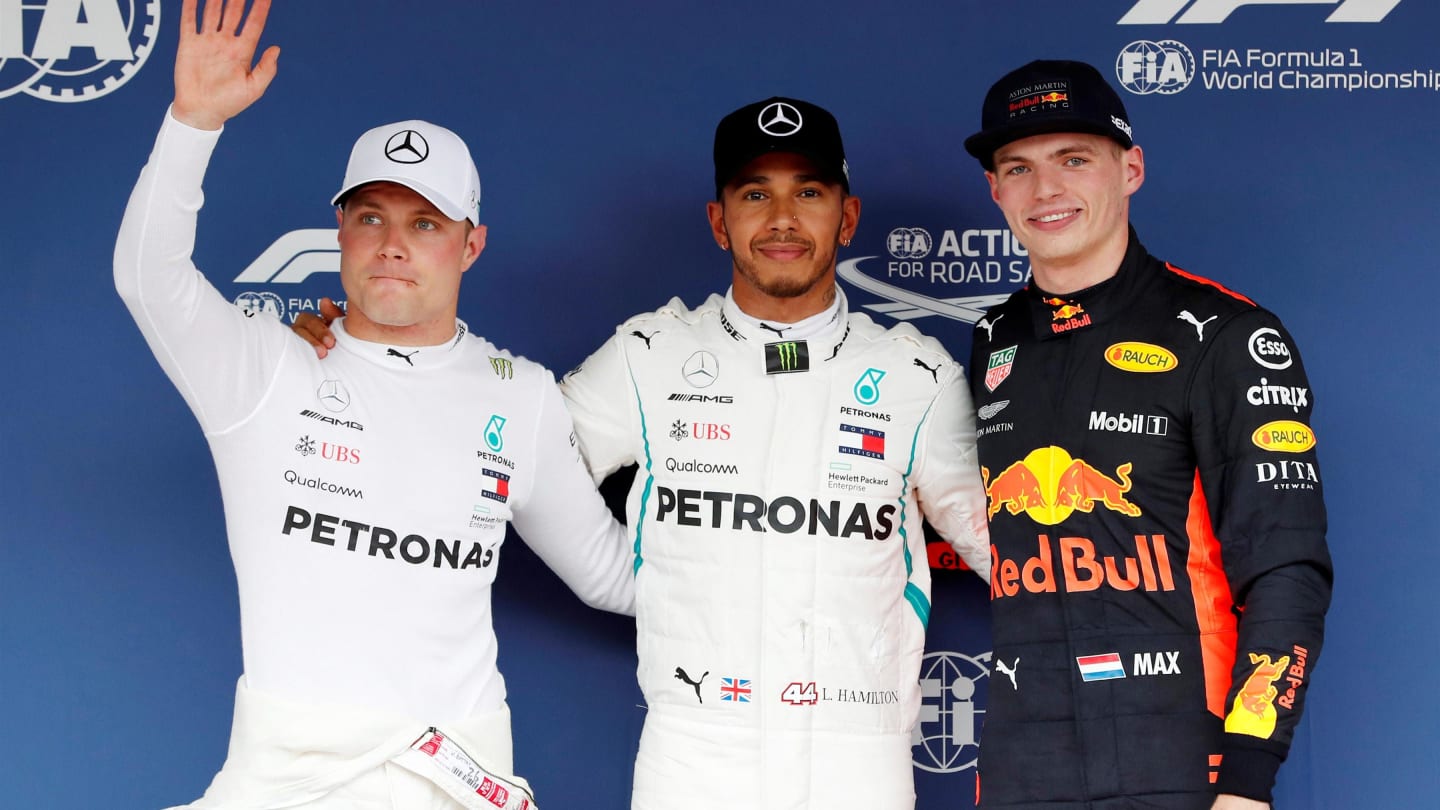 (L to R): Valtteri Bottas, Mercedes AMG F1, pole sitter Lewis Hamilton, Mercedes AMG F1 and Max