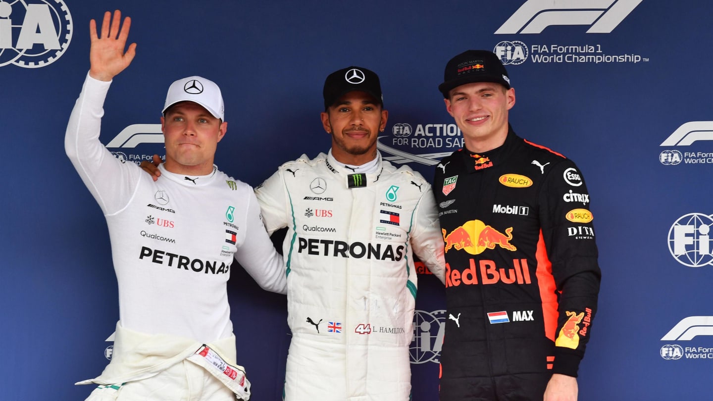 (L to R): Valtteri Bottas, Mercedes AMG F1, Lewis Hamilton, Mercedes AMG F1 and Max Verstappen, Red Bull Racing celebrate in parc ferme at Formula One World Championship, Rd17, Japanese Grand Prix, Qualifying, Suzuka, Japan, Saturday 6 October 2018.