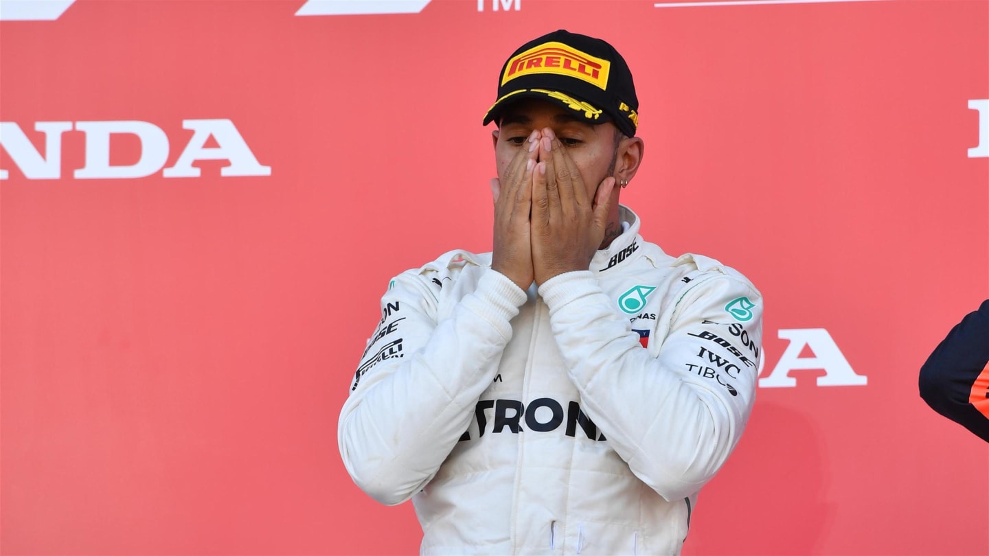 Race winner Lewis Hamilton, Mercedes AMG F1 celebrates on the podium at Formula One World Championship, Rd17, Japanese Grand Prix, Race, Suzuka, Japan, Sunday 7 October 2018.