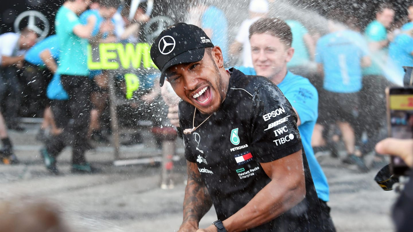 Lewis Hamilton, Mercedes AMG F1 celebrates with the team and the champagne at Formula One World Championship, Rd17, Japanese Grand Prix, Race, Suzuka, Japan, Sunday 7 October 2018.