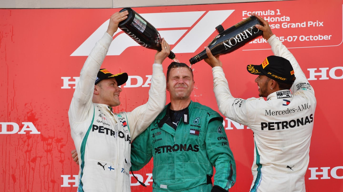 (L to R): Valtteri Bottas, Mercedes AMG F1, Matt Deane, Mercedes AMG F1 Chief Mechanic and Lewis Hamilton, Mercedes AMG F1 celebrate on the podium with the champagne at Formula One World Championship, Rd17, Japanese Grand Prix, Race, Suzuka, Japan, Sunday 7 October 2018.