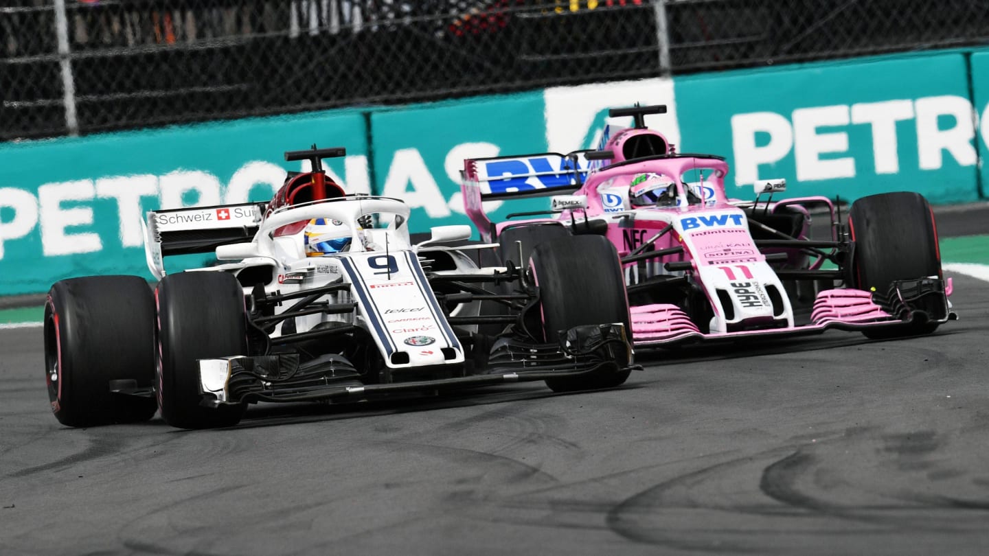 Marcus Ericsson, Alfa Romeo Sauber C37 and Sergio Perez, Racing Point Force India VJM11 battle at Formula One World Championship, Rd19, Mexican Grand Prix, Race, Circuit Hermanos Rodriguez, Mexico City, Mexico, Sunday 28 October 2018.