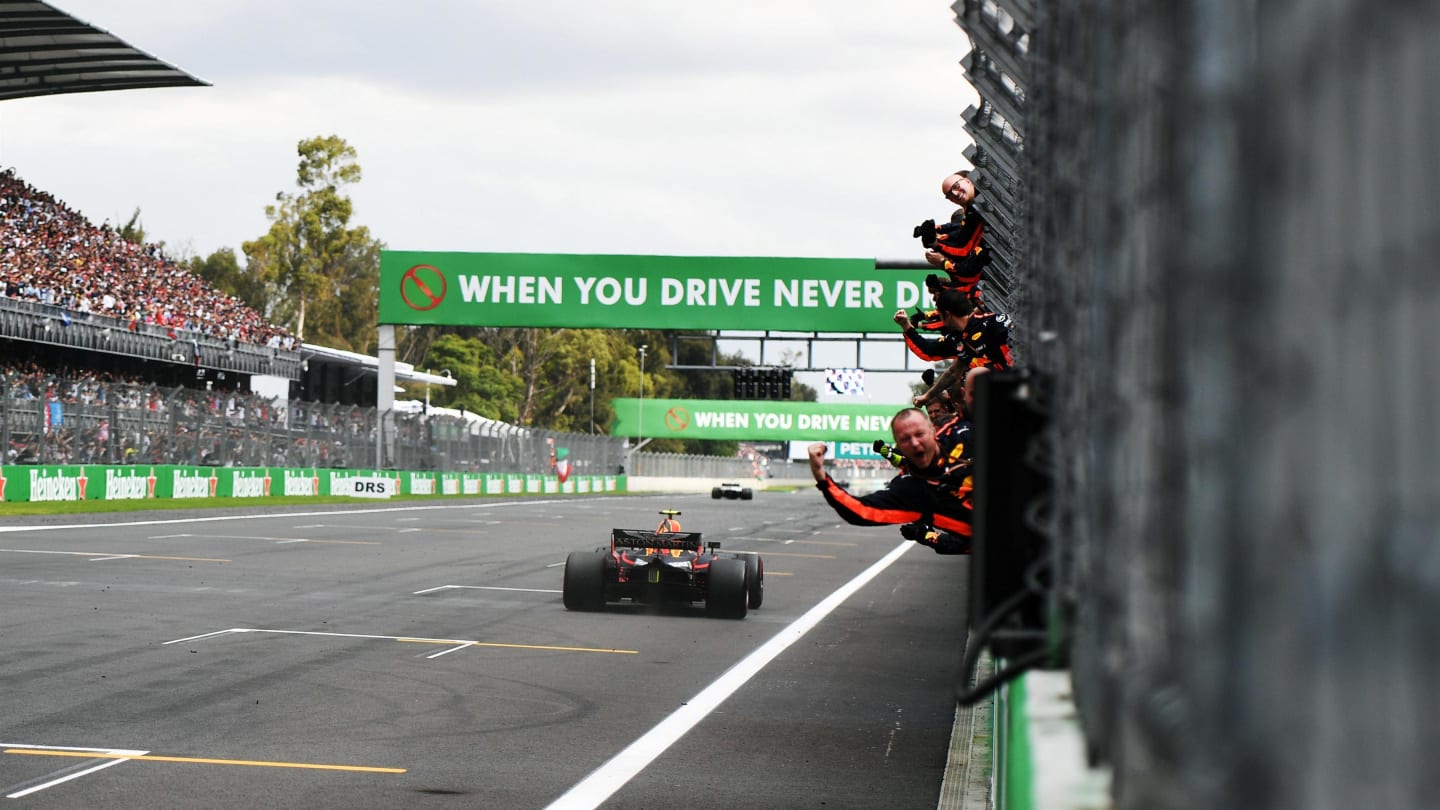 Race Winner Max Verstappen, Red Bull Racing RB14 crosses the line at Formula One World