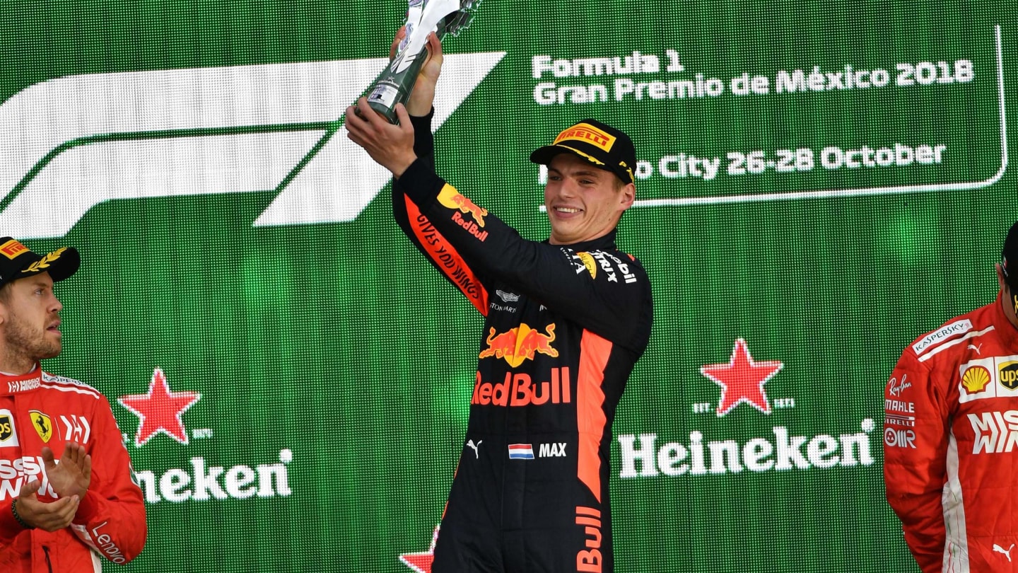 Max Verstappen, Red Bull Racing celebrates on the podium with the trophy at Formula One World