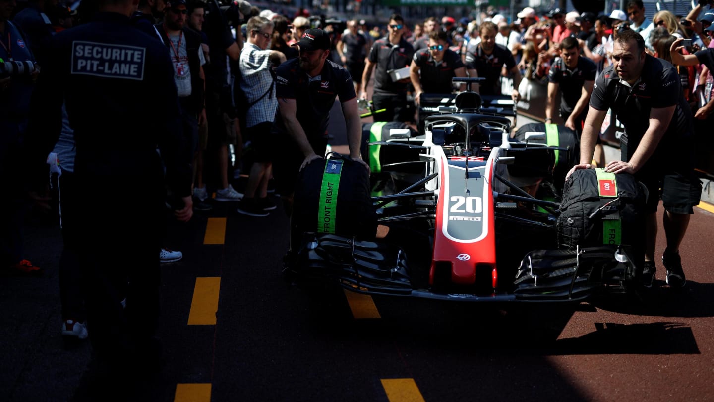 Haas VF-18 pushed by Haas F1 mechanics in pit lane at Formula One World Championship, Rd6, Monaco Grand Prix Friday, Monte-Carlo, Monaco, 25 May 2018. © Manuel Goria/Sutton Images