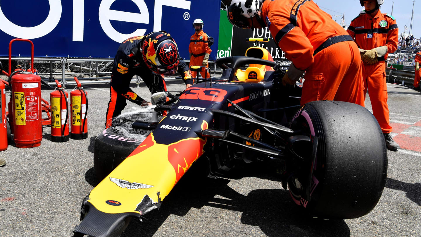 Max Verstappen (NED) Red Bull Racing RB14 looks at his crashed car in FP3 at Formula One World