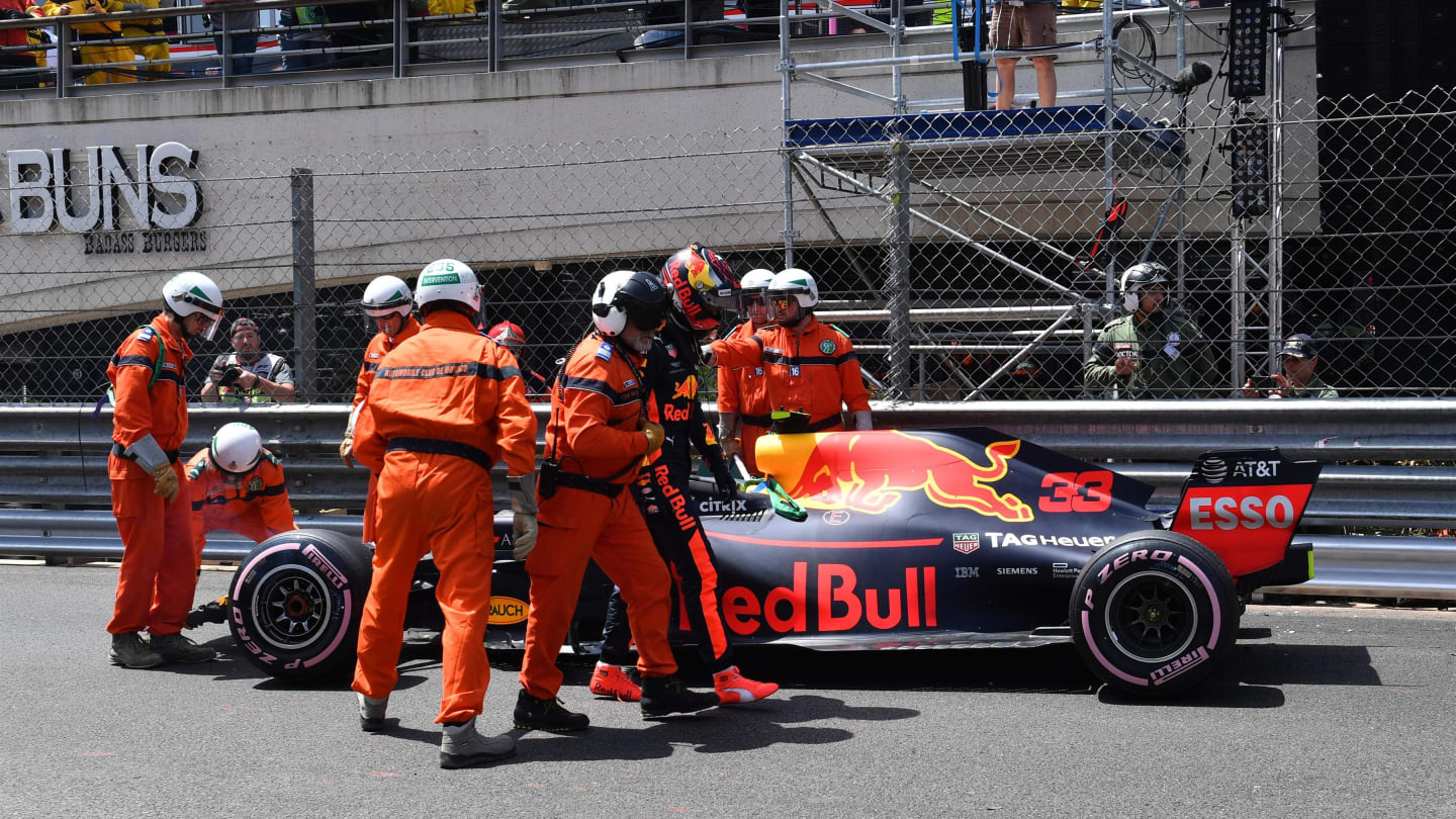 Marshals recover the crashed car of Max Verstappen (NED) Red Bull Racing RB14 in FP3 at Formula One World Championship, Rd6, Monaco Grand Prix, Qualifying, Monte-Carlo, Monaco, Saturday 26 May 2018. © Mark Sutton/Sutton Images