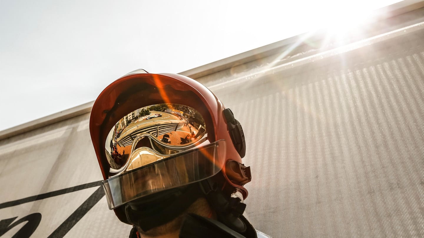 Marcus Ericsson (SWE) Alfa Romeo Sauber C37 reflected in a firemans helmet at Formula One World Championship, Rd6, Monaco Grand Prix, Qualifying, Monte-Carlo, Monaco, Saturday 26 May 2018. © Manuel Goria/Sutton Images