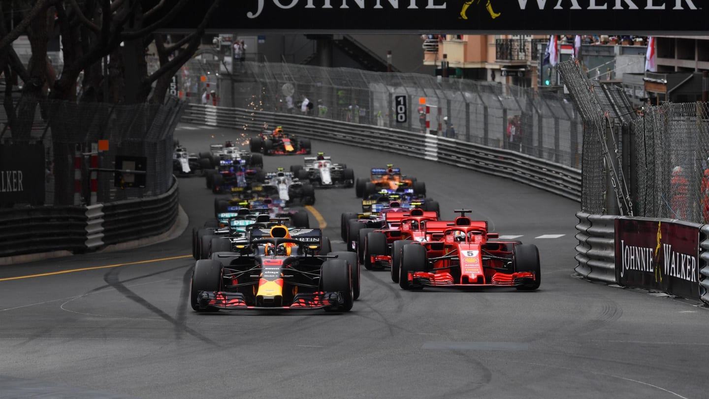 Daniel Ricciardo (AUS) Red Bull Racing RB14 leads Sebastian Vettel (GER) Ferrari SF-71H at the start of the race at Formula One World Championship, Rd6, Monaco Grand Prix, Race, Monte-Carlo, Monaco, Sunday 27 May 2018. © Mark Sutton/Sutton Images