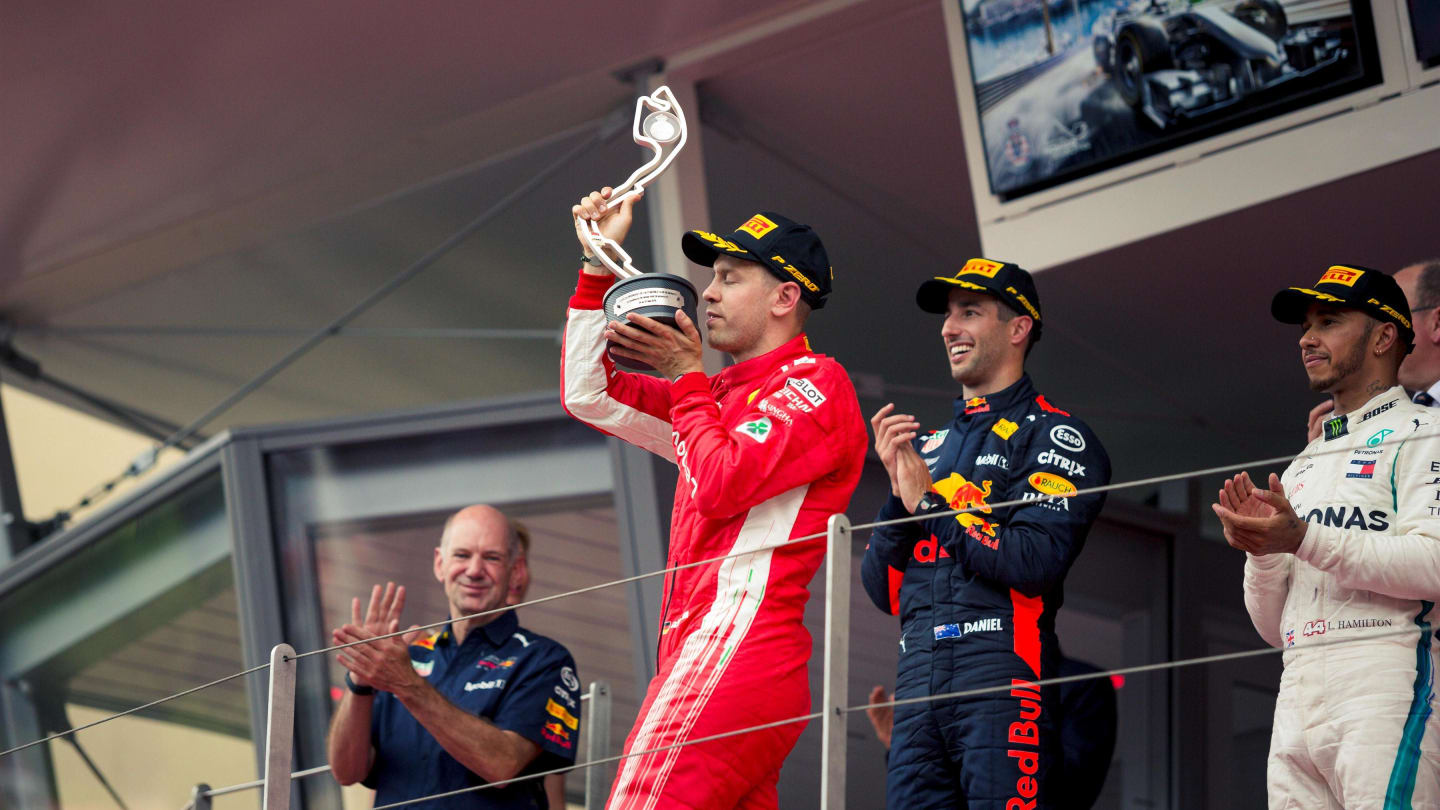 Sebastian Vettel (GER) Ferrari celebrates on the podium with the trophy at Formula One World Championship, Rd6, Monaco Grand Prix, Race, Monte-Carlo, Monaco, Sunday 27 May 2018. © Manuel Goria/Sutton Images
