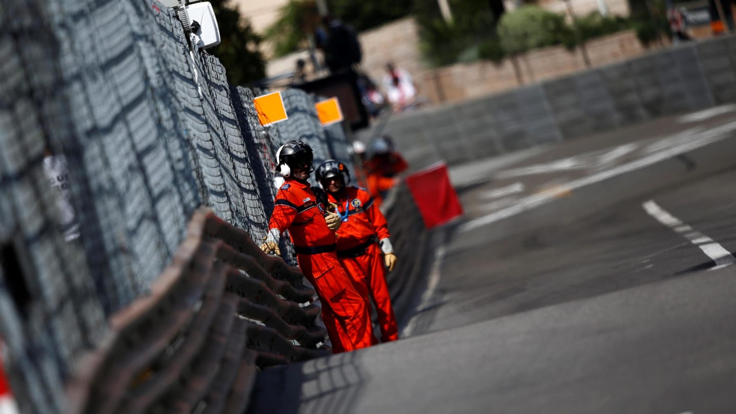 Marshals wave the red flag for drain repair in FP2 at Formula One World Championship, Rd6, Monaco Grand Prix, Practice, Monte-Carlo, Monaco, Thursday 24 May 2018. © Manuel Goria/Sutton Images
