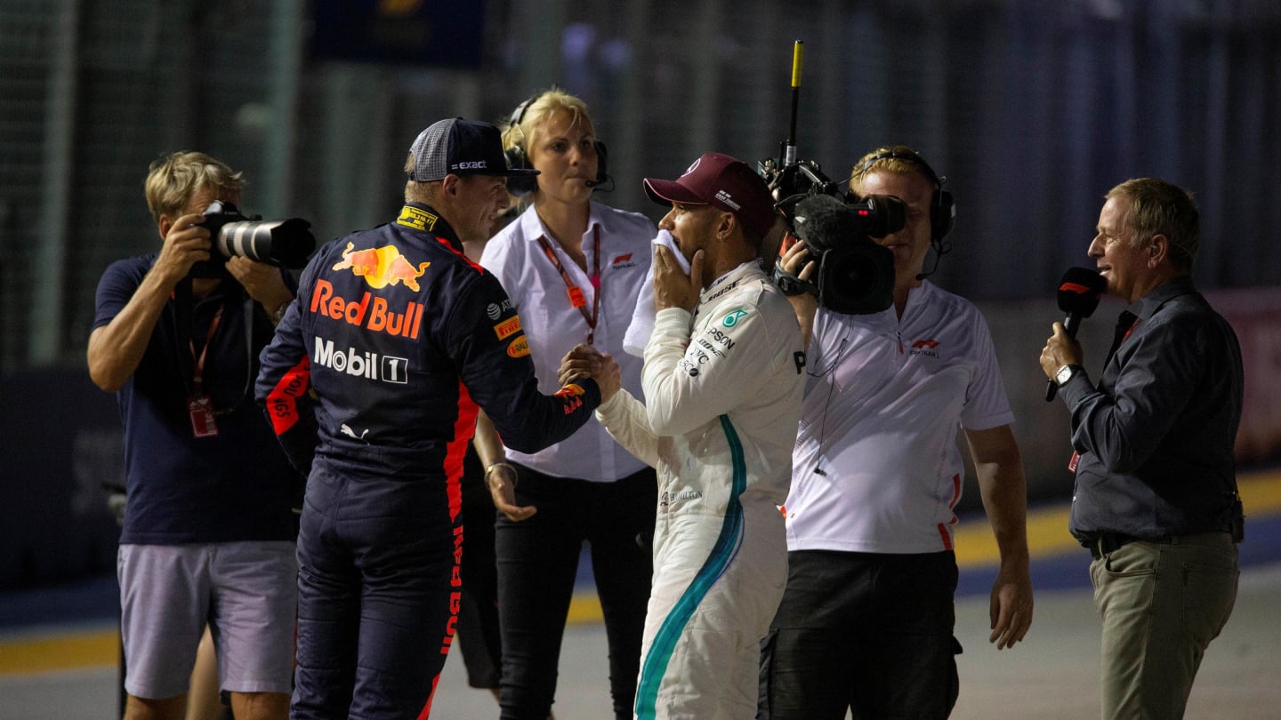 Max Verstappen, Red Bull Racing and Lewis Hamilton, Mercedes AMG F1 celebrate in parc ferme at