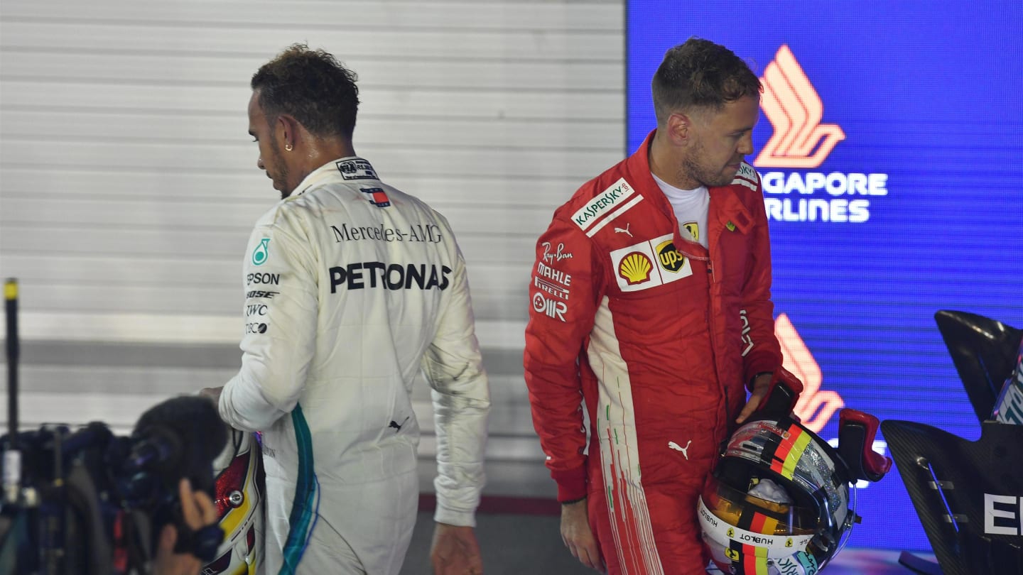 Lewis Hamilton, Mercedes AMG F1 and Sebastian Vettel, Ferrari in parc ferme at Formula One World Championship, Rd15, Singapore Grand Prix, Race, Marina Bay Circuit, Singapore, Sunday 16 September 2018.