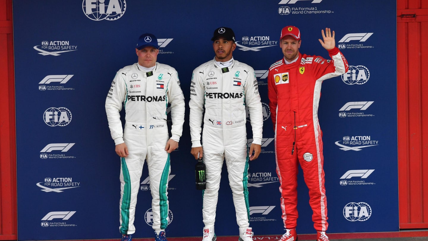 (L to R): Valtteri Bottas (FIN) Mercedes-AMG F1,pole sitter Lewis Hamilton (GBR) Mercedes-AMG F1 and Sebastian Vettel (GER) Ferrari celebrate in parc ferme at Formula One World Championship, Rd5, Spanish Grand Prix, Qualifying, Barcelona, Spain, Saturday 12 May 2018. © Jerry Andre/Sutton Images
