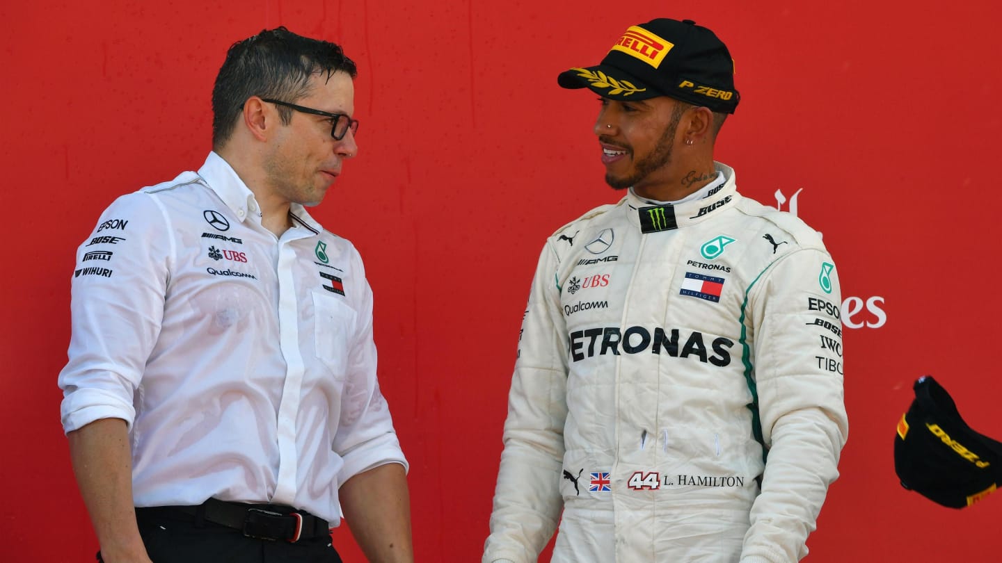 Peter Bonnington (GBR) Mercedes AMG F1 Race Engineer celebrates on the podium with Lewis Hamilton
