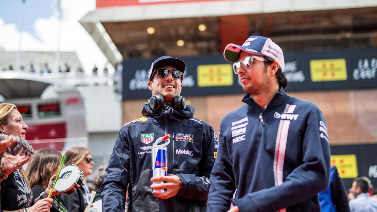 Sergio Perez (MEX) Force India and Daniel Ricciardo (AUS) Red Bull Racing on the drivers parade at