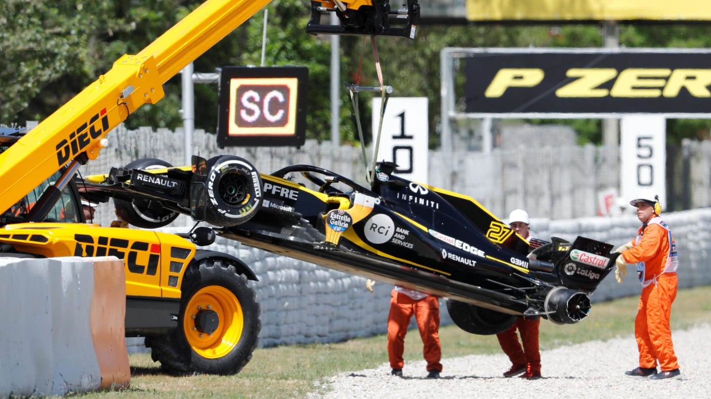 The crashed car of Nico Hulkenberg (GER) Renault Sport F1 Team RS18 is recovered at Formula One World Championship, Rd5, Spanish Grand Prix, Race, Barcelona, Spain, Sunday 13 May 2018. © Zak Mauger/LAT/Sutton Images