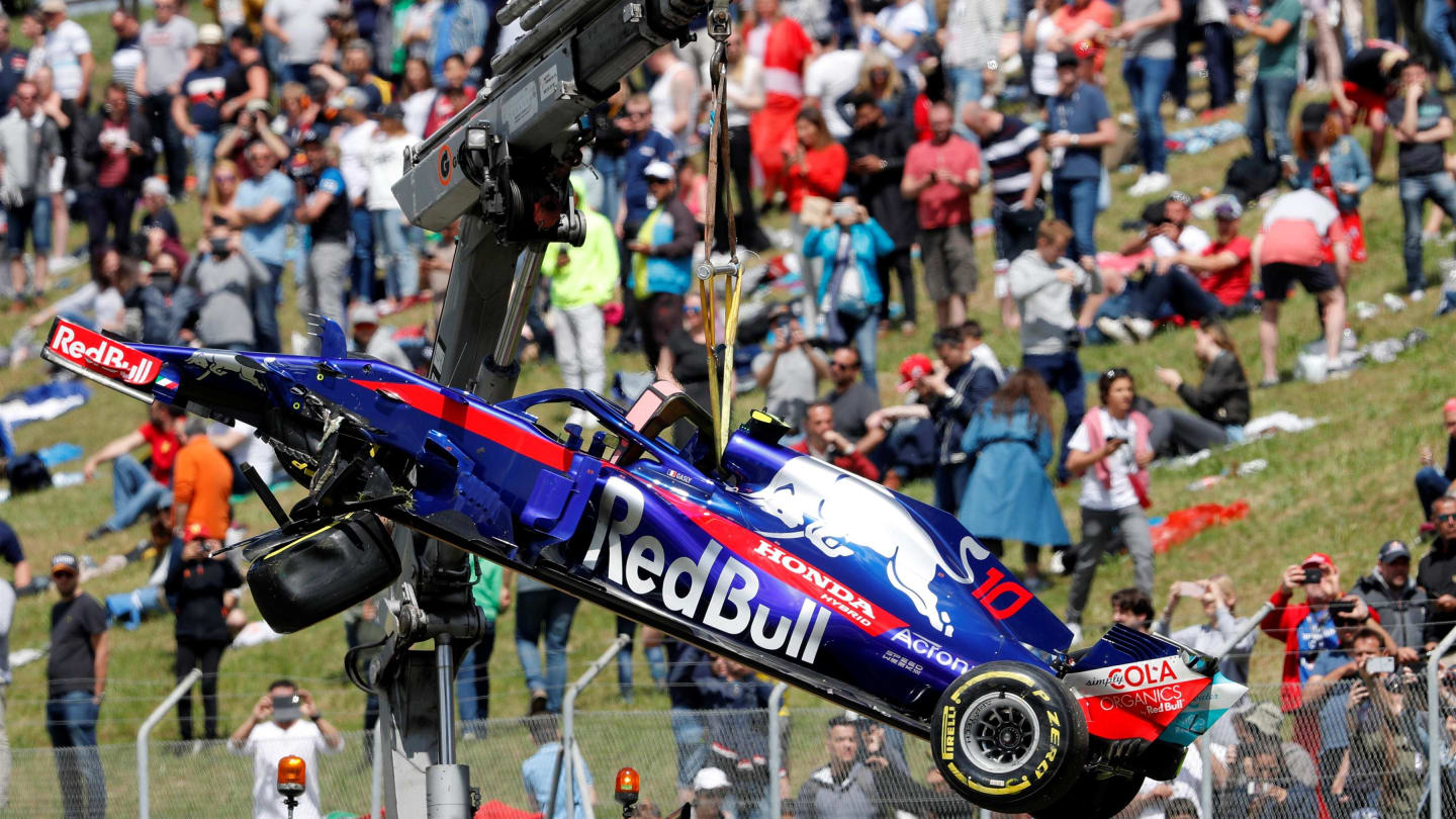 The crashed car of Pierre Gasly (FRA) Scuderia Toro Rosso STR13 is recovered at Formula One World Championship, Rd5, Spanish Grand Prix, Race, Barcelona, Spain, Sunday 13 May 2018. © Zak Mauger/LAT/Sutton Images