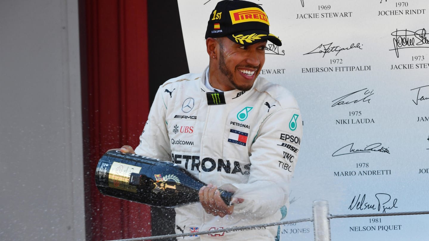 Race winner Lewis Hamilton (GBR) Mercedes-AMG F1 celebrates on the podium with the champagne at Formula One World Championship, Rd5, Spanish Grand Prix, Race, Barcelona, Spain, Sunday 13 May 2018. © Mark Sutton/Sutton Images