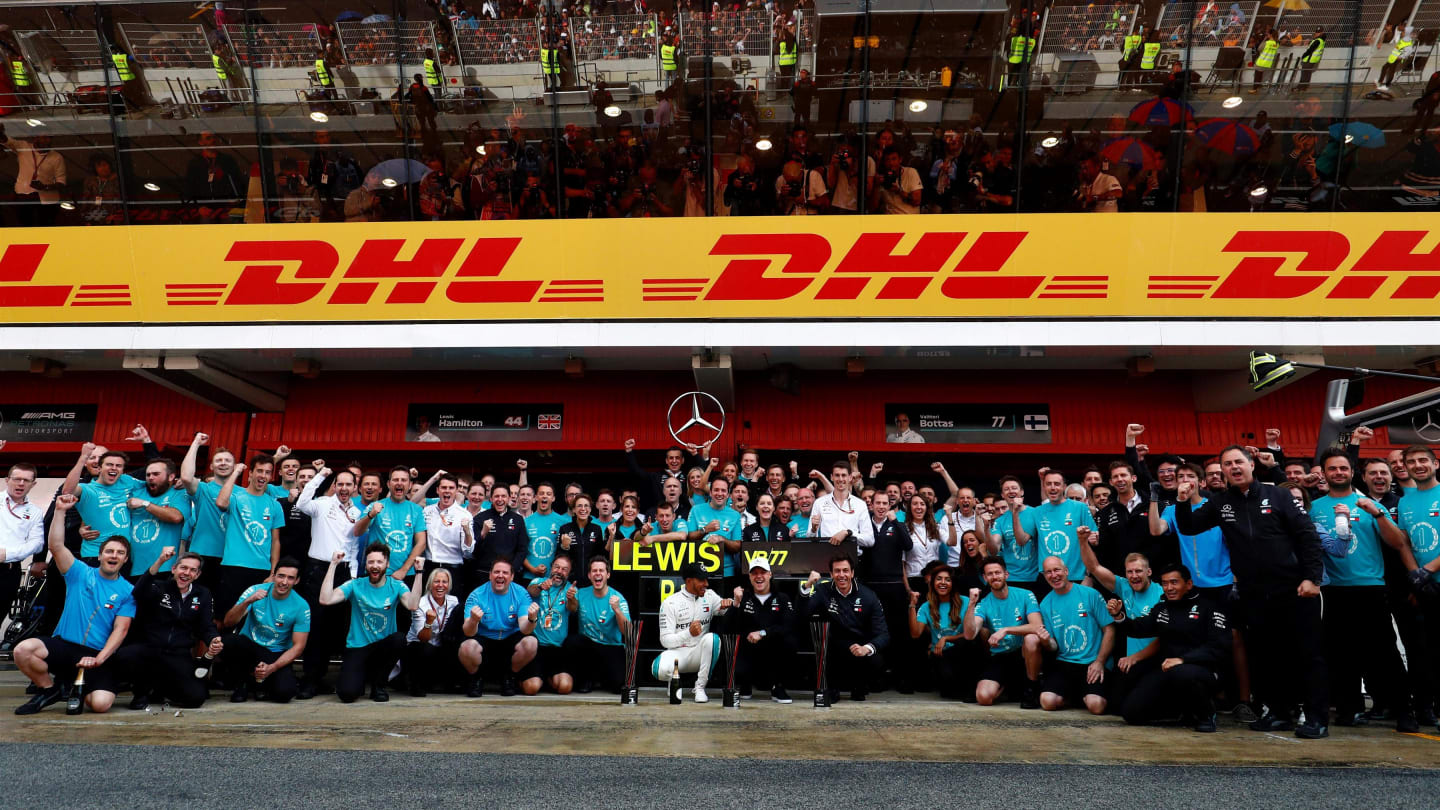 Race winner Lewis Hamilton (GBR) Mercedes-AMG F1 and Valtteri Bottas (FIN) Mercedes-AMG F1 celebrate with the team at Formula One World Championship, Rd5, Spanish Grand Prix, Race, Barcelona, Spain, Sunday 13 May 2018. © Sam Bloxham/LAT/Sutton Images