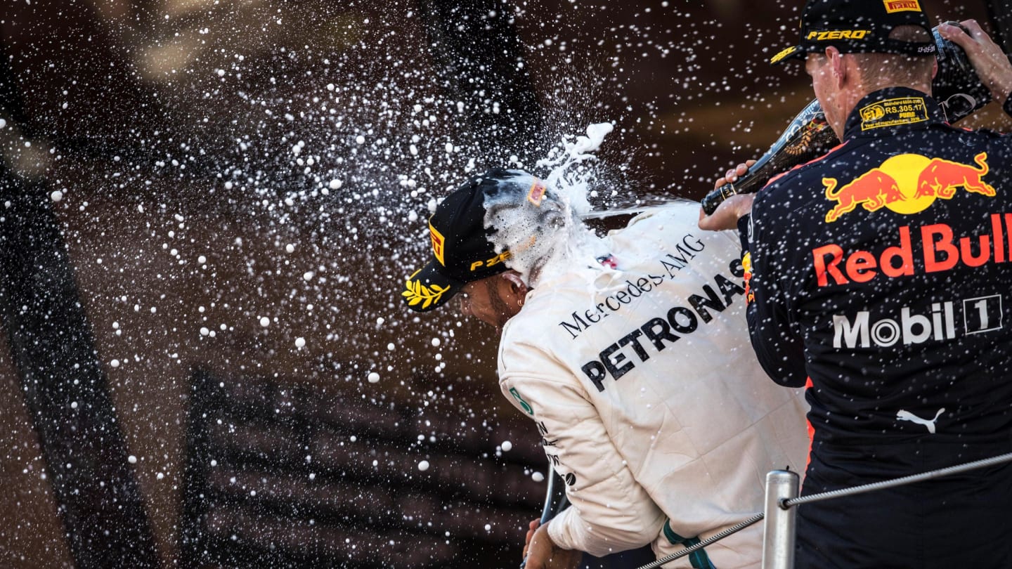 Race winner Lewis Hamilton (GBR) Mercedes-AMG F1 and Max Verstappen (NED) Red Bull Racing celebrate on the podium with the champagne at Formula One World Championship, Rd5, Spanish Grand Prix, Race, Barcelona, Spain, Sunday 13 May 2018. © Manuel Goria/Sutton Images