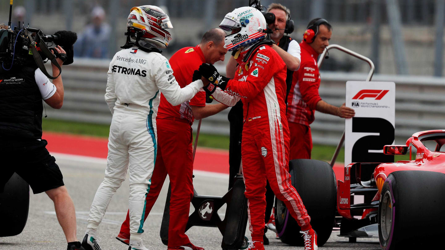 Pole sitter Lewis Hamilton, Mercedes AMG F1 celebrates in Parc Ferme with Sebastian Vettel, Ferrari