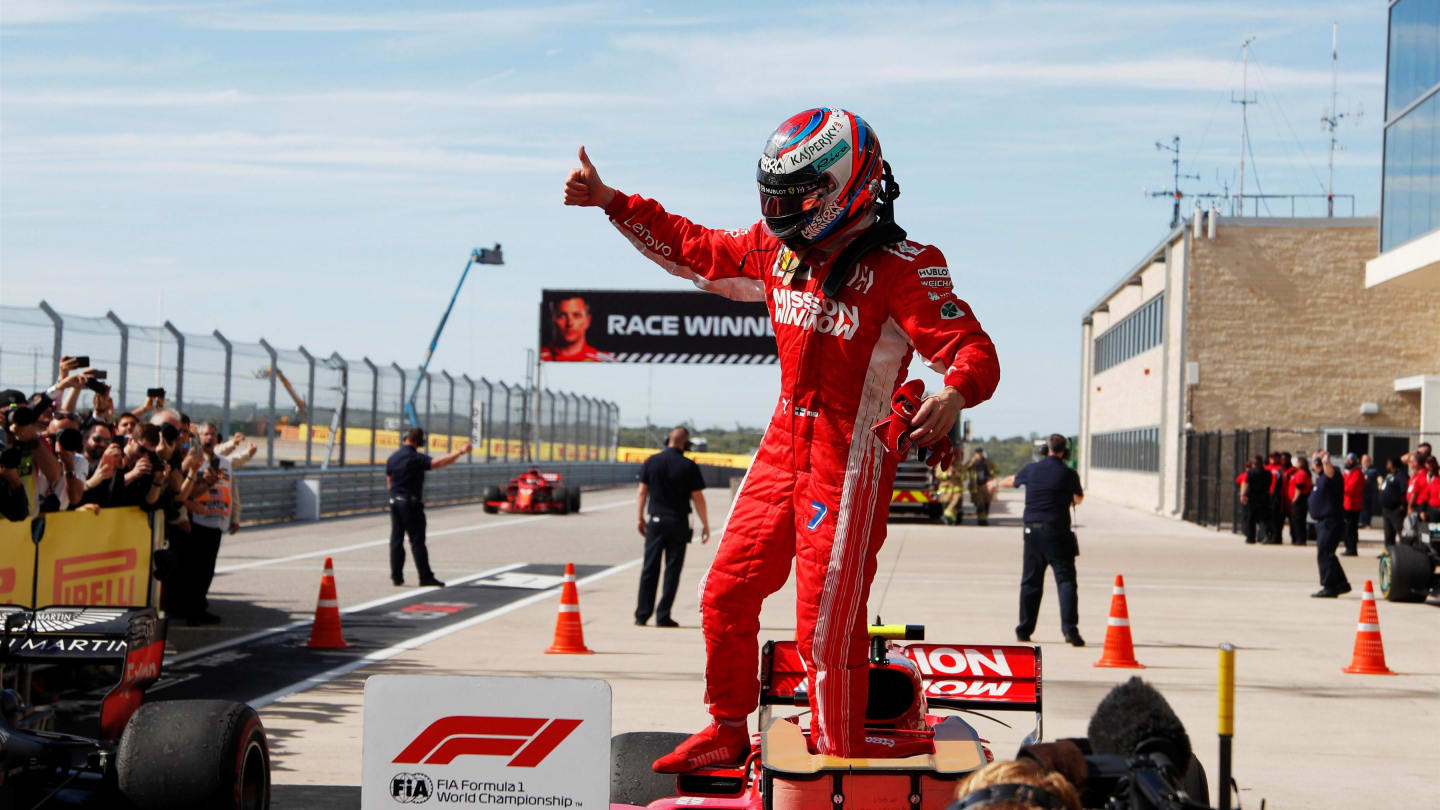 Race winner Kimi Raikkonen, Ferrari celebrates in Parc Ferme at Formula One World Championship,