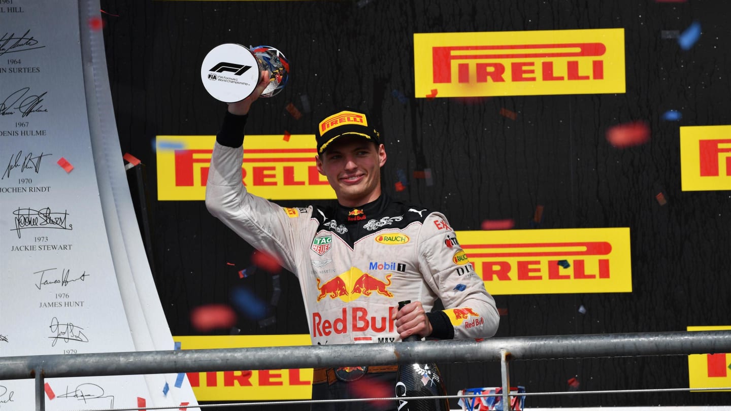 Max Verstappen, Red Bull Racing celebrates with the trophy and the champagne on the podium at