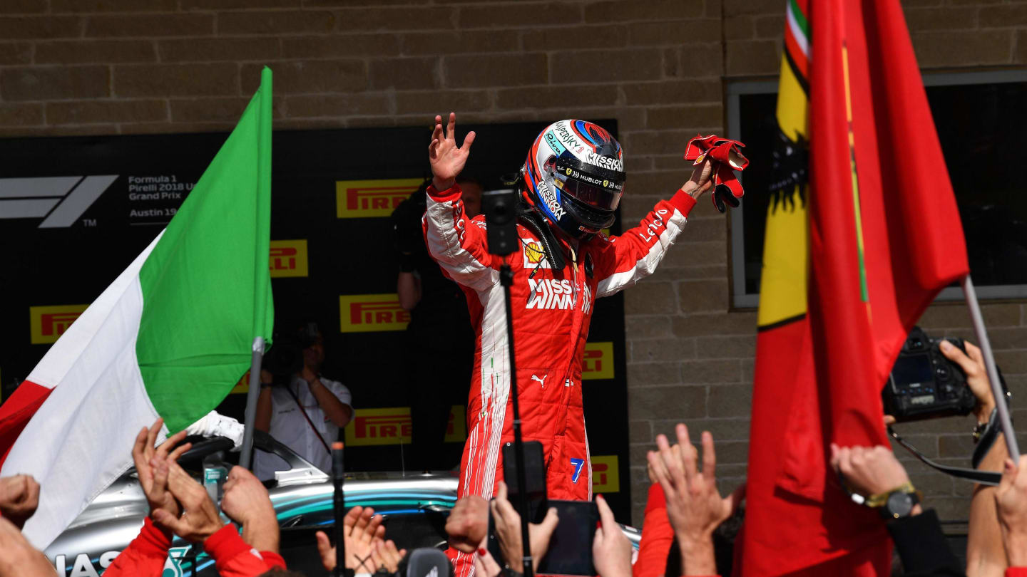 Race winner Kimi Raikkonen, Ferrari celebrates in Parc Ferme at Formula One World Championship,
