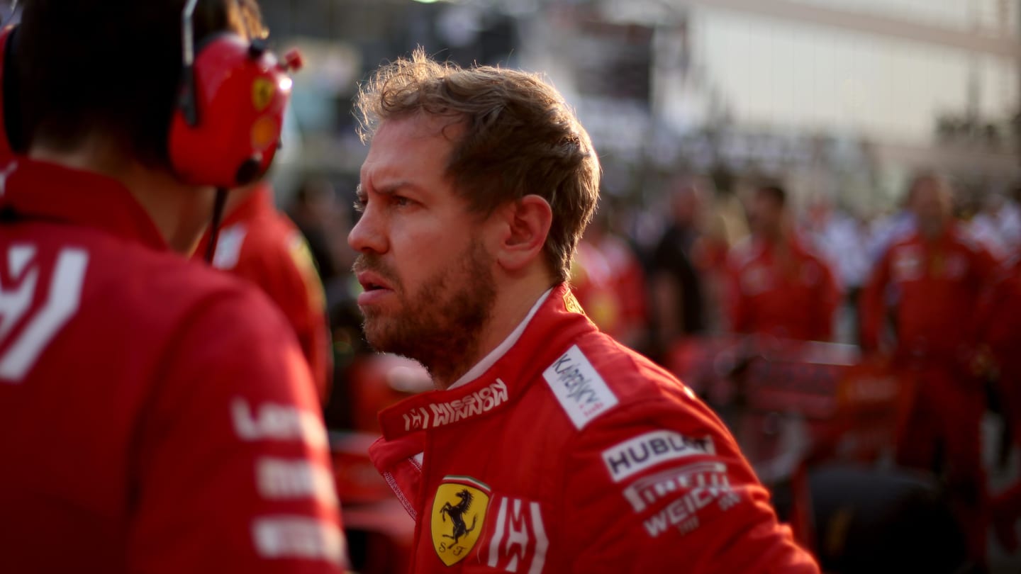 ABU DHABI, UNITED ARAB EMIRATES - DECEMBER 01: Sebastian Vettel of Germany and Ferrari prepares to