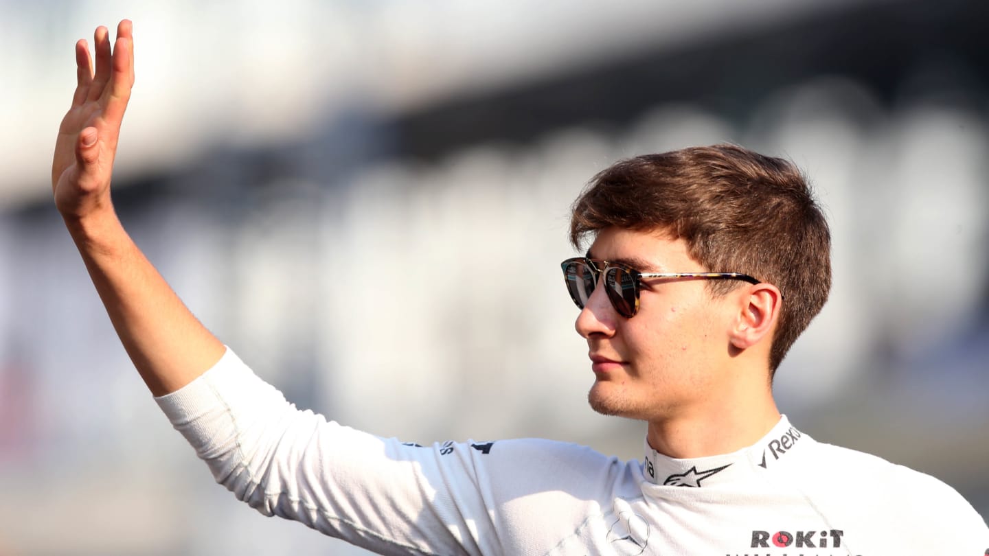 ABU DHABI, UNITED ARAB EMIRATES - DECEMBER 01: George Russell of Great Britain and Williams waves to the crowd on the drivers parade before the F1 Grand Prix of Abu Dhabi at Yas Marina Circuit on December 01, 2019 in Abu Dhabi, United Arab Emirates. (Photo by Charles Coates/Getty Images)