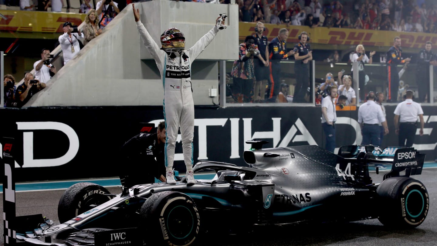 ABU DHABI, UNITED ARAB EMIRATES - DECEMBER 01: Race winner Lewis Hamilton of Great Britain and