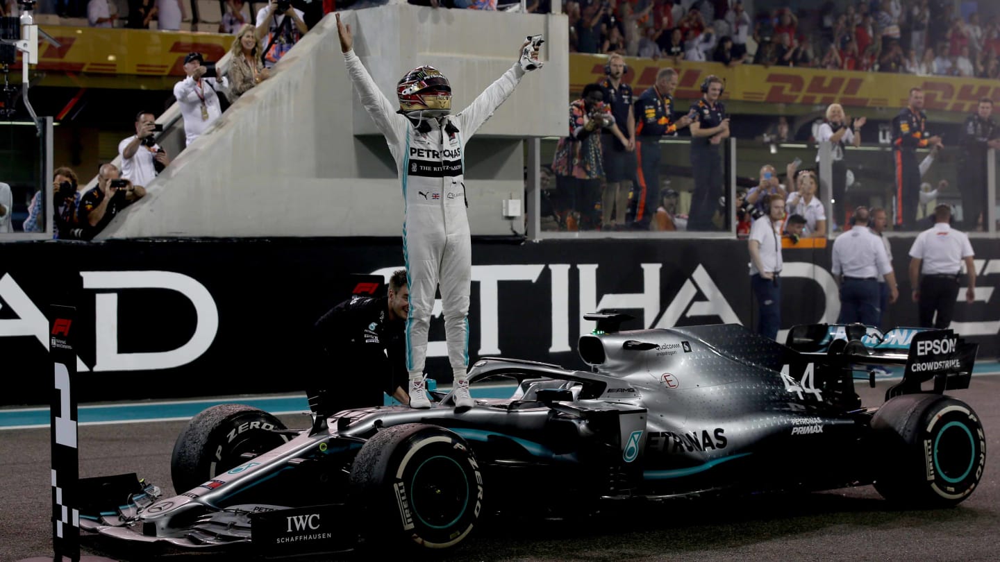 ABU DHABI, UNITED ARAB EMIRATES - DECEMBER 01: Race winner Lewis Hamilton of Great Britain and