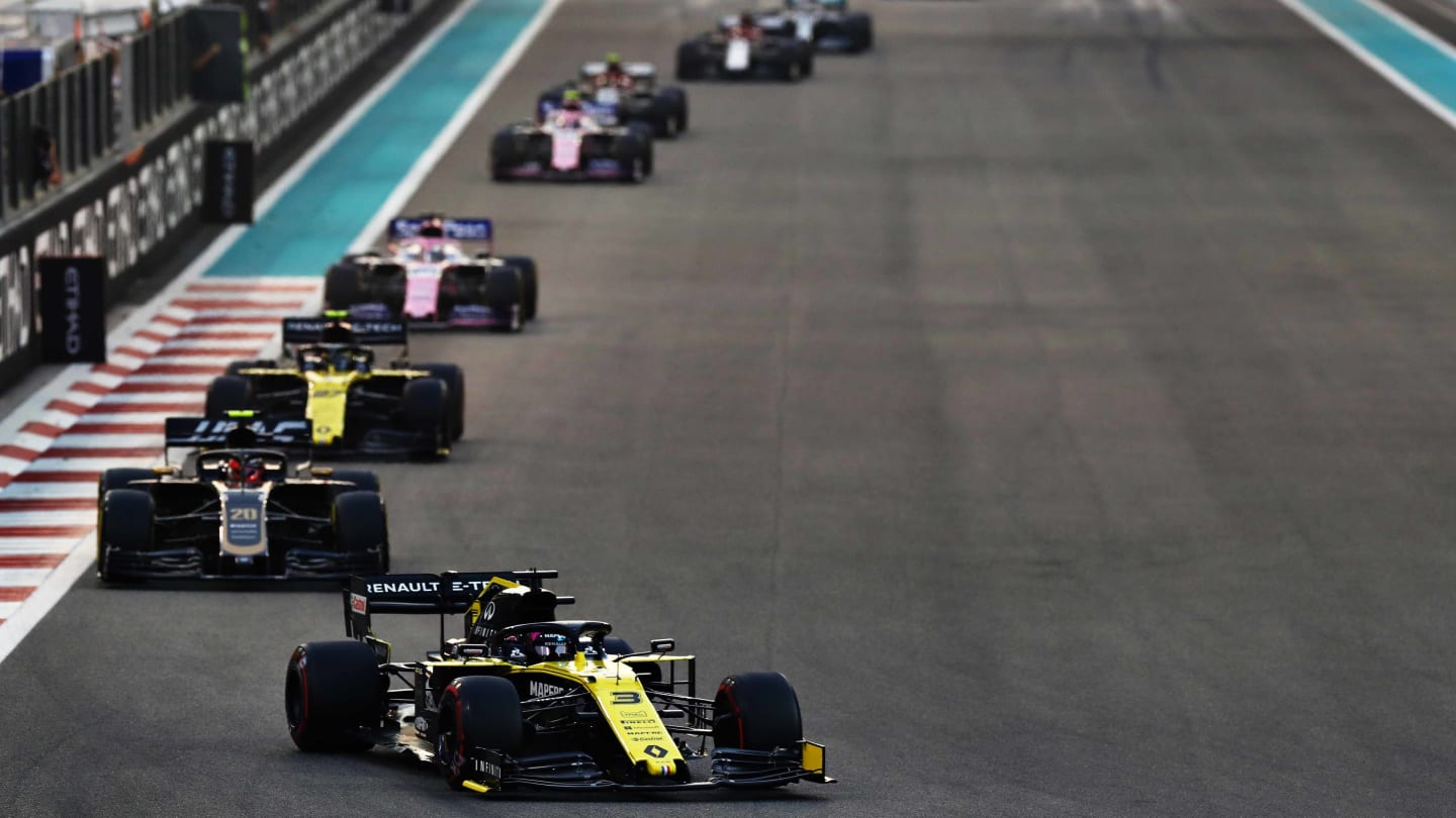 ABU DHABI, UNITED ARAB EMIRATES - DECEMBER 01: Daniel Ricciardo of Australia driving the (3) Renault Sport Formula One Team RS19 leads Kevin Magnussen of Denmark driving the (20) Haas F1 Team VF-19 Ferrari on track during the F1 Grand Prix of Abu Dhabi at Yas Marina Circuit on December 01, 2019 in Abu Dhabi, United Arab Emirates. (Photo by Mark Thompson/Getty Images)