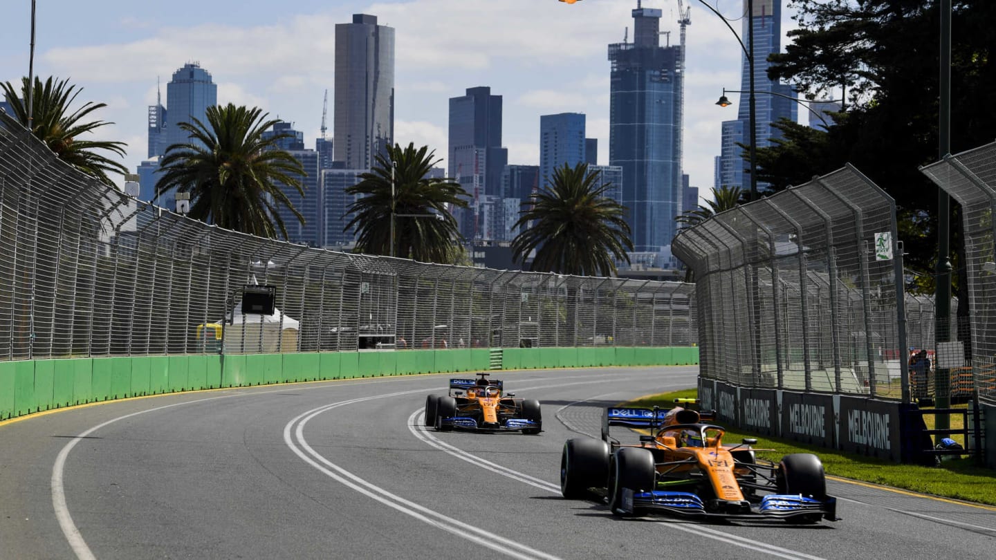 MELBOURNE GRAND PRIX CIRCUIT, AUSTRALIA - MARCH 15: Lando Norris, McLaren MCL34, leads Carlos Sainz