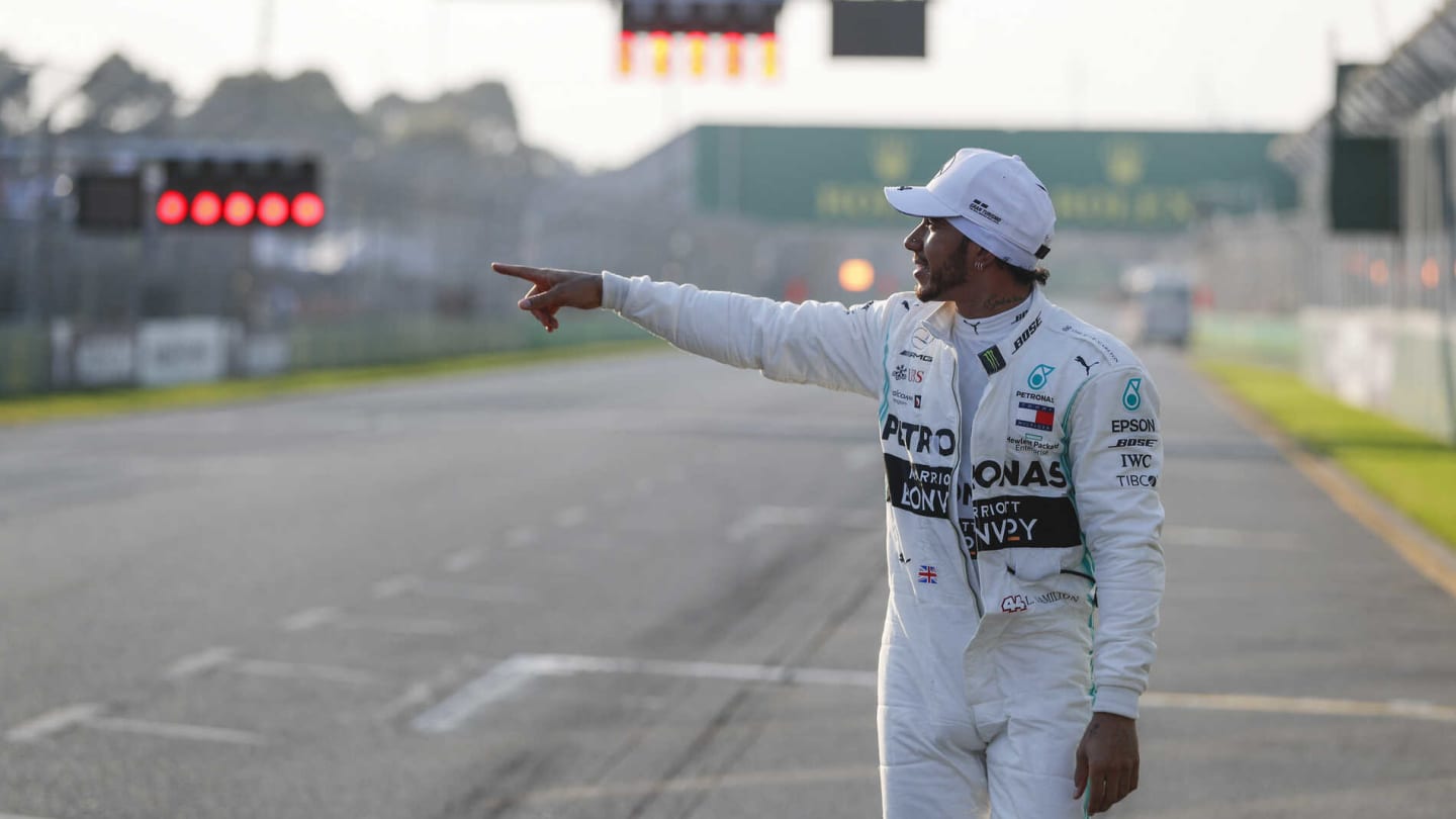 MELBOURNE GRAND PRIX CIRCUIT, AUSTRALIA - MARCH 16: Pole Sitter celebrates Lewis Hamilton, Mercedes