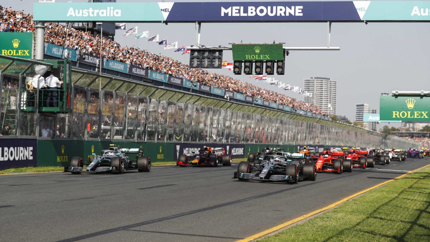 MELBOURNE GRAND PRIX CIRCUIT, AUSTRALIA - MARCH 17: The lights go out and Lewis Hamilton, Mercedes