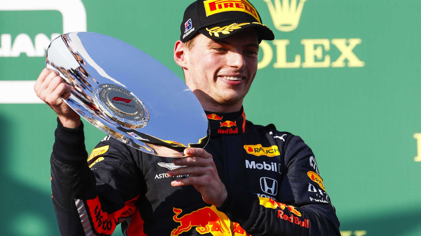 MELBOURNE GRAND PRIX CIRCUIT, AUSTRALIA - MARCH 17: Max Verstappen, Red Bull Racing celebrates on the podium with the trophy during the Australian GP at Melbourne Grand Prix Circuit on March 17, 2019 in Melbourne Grand Prix Circuit, Australia. (Photo by Glenn Dunbar / LAT Images)