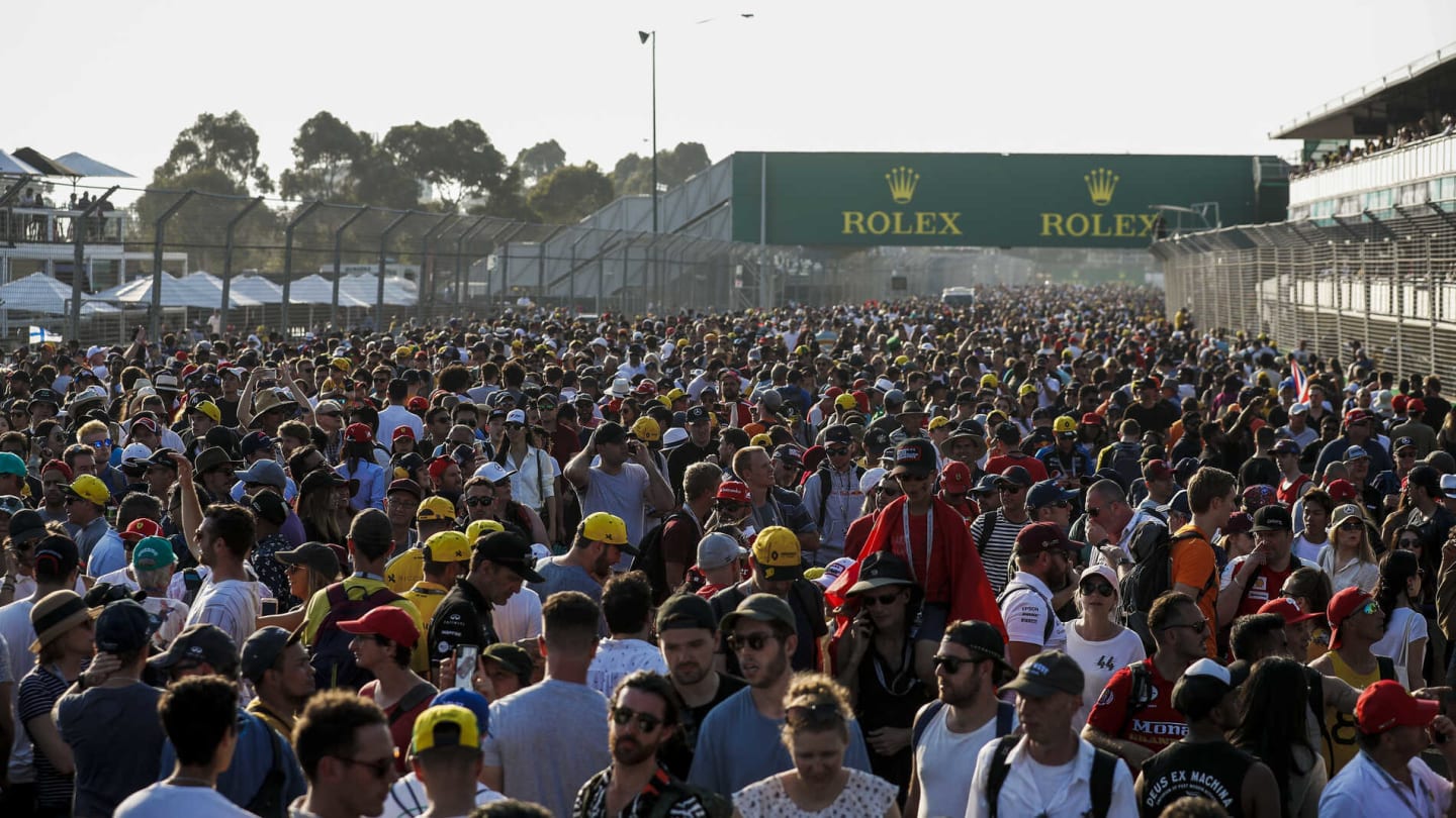 MELBOURNE GRAND PRIX CIRCUIT, AUSTRALIA - MARCH 17: Fans flood the circuit after the race during