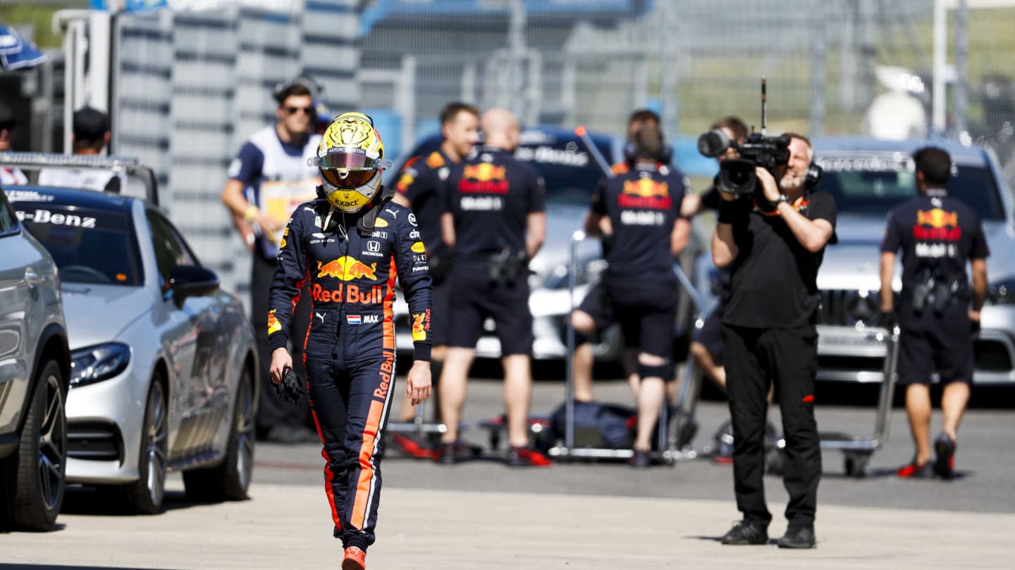 RED BULL RING, AUSTRIA - JUNE 28: Max Verstappen, Red Bull Racing walks down the pit lane after