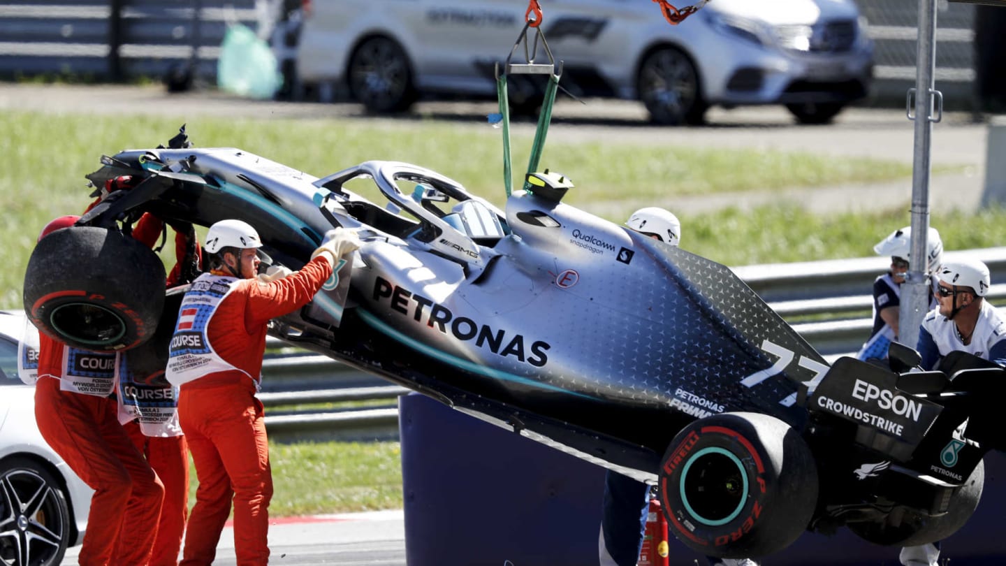 RED BULL RING, AUSTRIA - JUNE 28: Car of Valtteri Bottas, Mercedes AMG W10 being recovered after