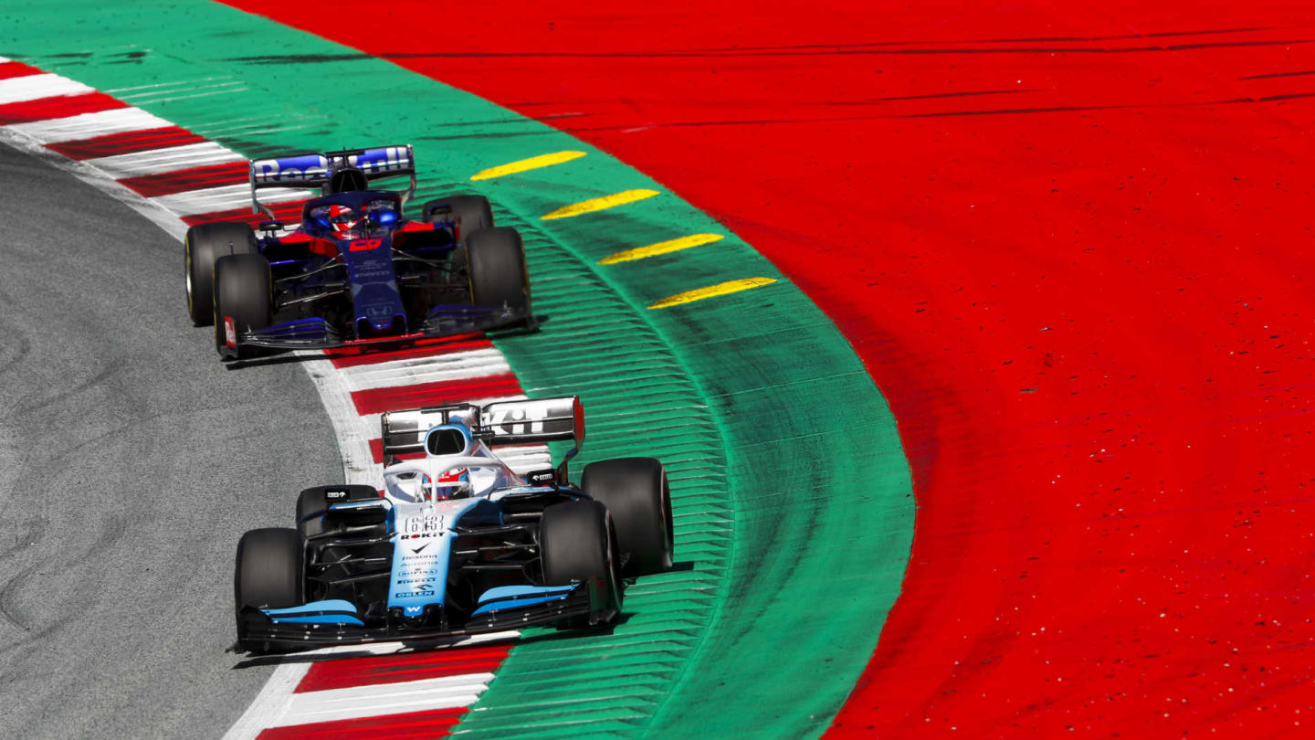 RED BULL RING, AUSTRIA - JUNE 28: George Russell, Williams Racing FW42, leads Daniil Kvyat, Toro
