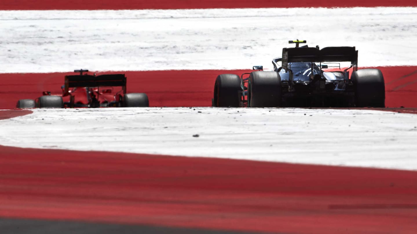 RED BULL RING, AUSTRIA - JUNE 29: Sebastian Vettel, Ferrari SF90, leads Valtteri Bottas, Mercedes