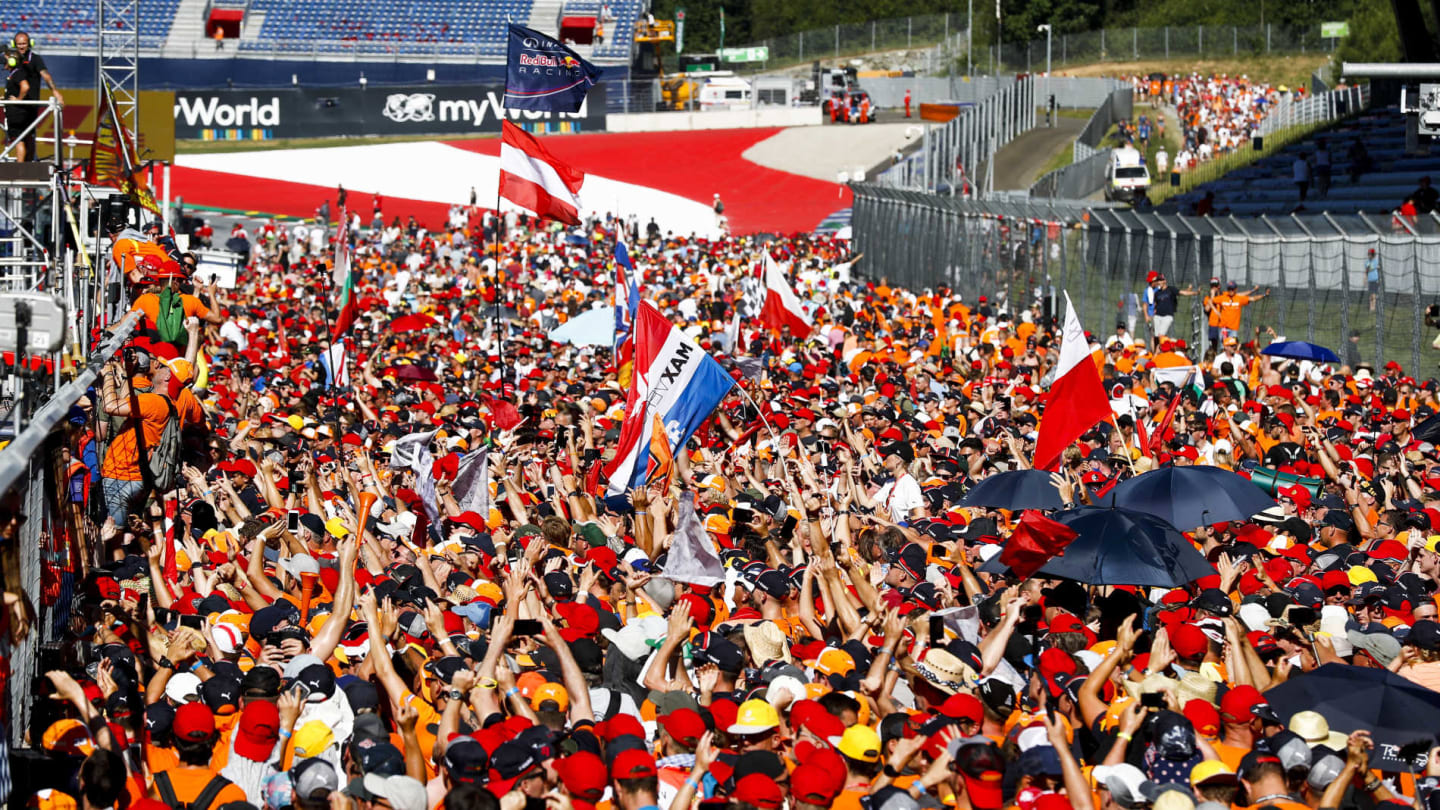 RED BULL RING, AUSTRIA - JUNE 30: Dutch Max Verstappen fans invade the track to celebrate the